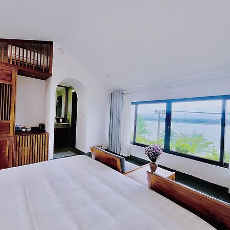 Serene Riverside Hotel Хойан Экстерьер фото